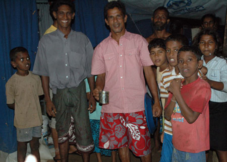 People at the bus station camp