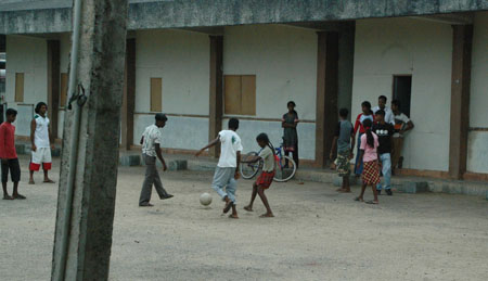 Children playing at the bus station camp