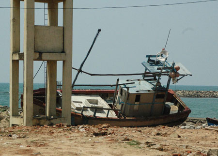 A boat swept to shore by the tsunami